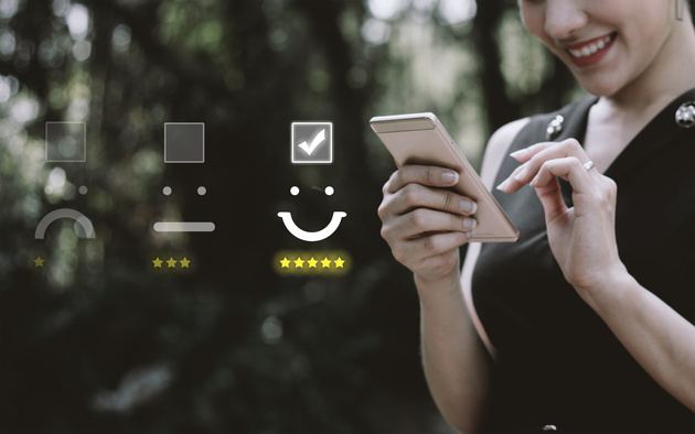 Happy women using her phone experiencing a great AI-powered conversational service